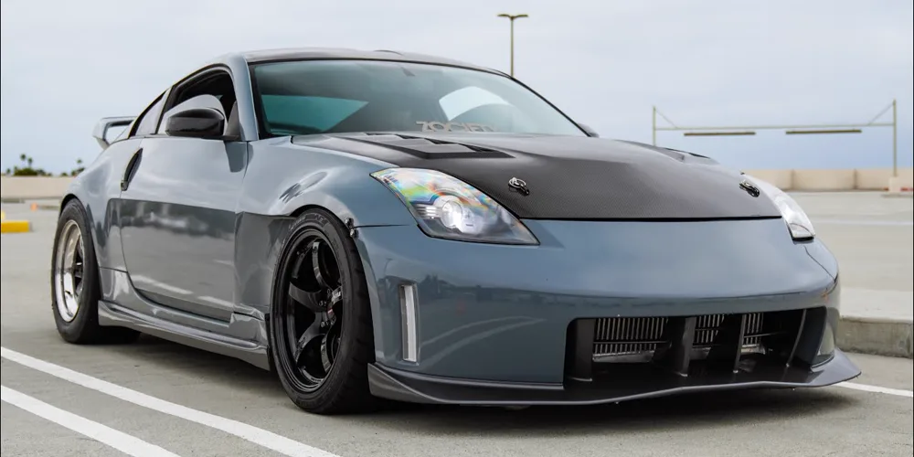 Grey Nismo 350Z with a carbon hood